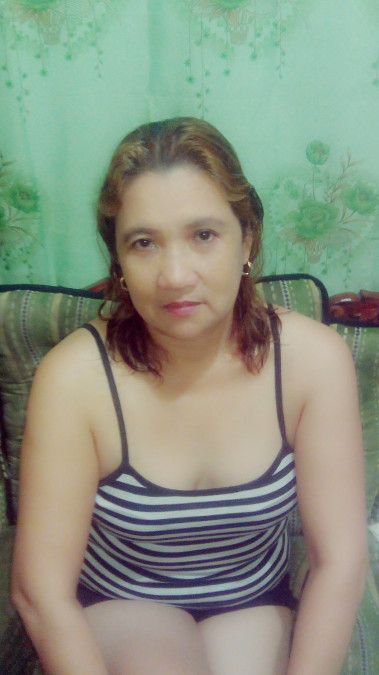 Emily Cruz, 48, Manila, Philippines