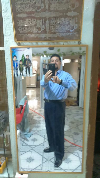 KAREEM, 58, Baghdad, Iraq