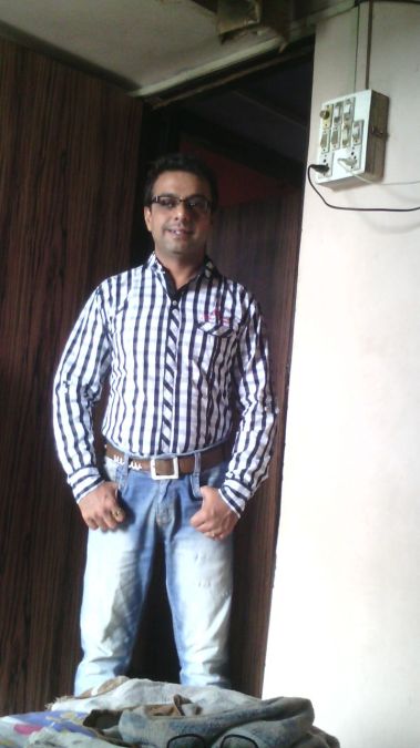 ANAND, 50, Mumbai, India