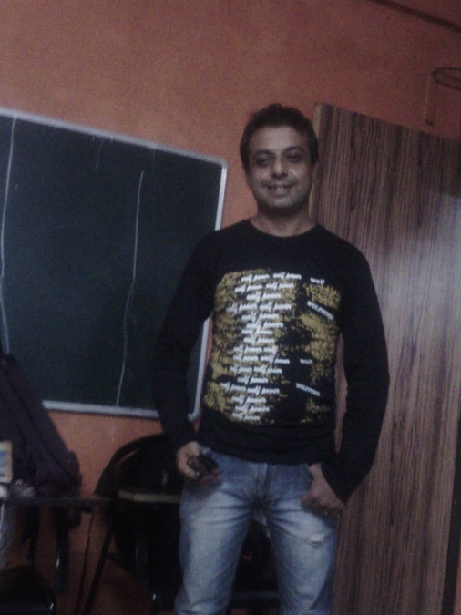 ANAND, 50, Mumbai, India