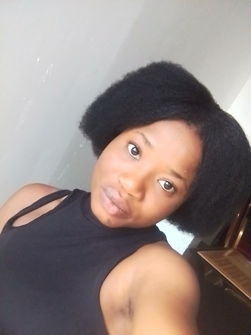 Uwase Divine, 22, Kigali, Rwanda